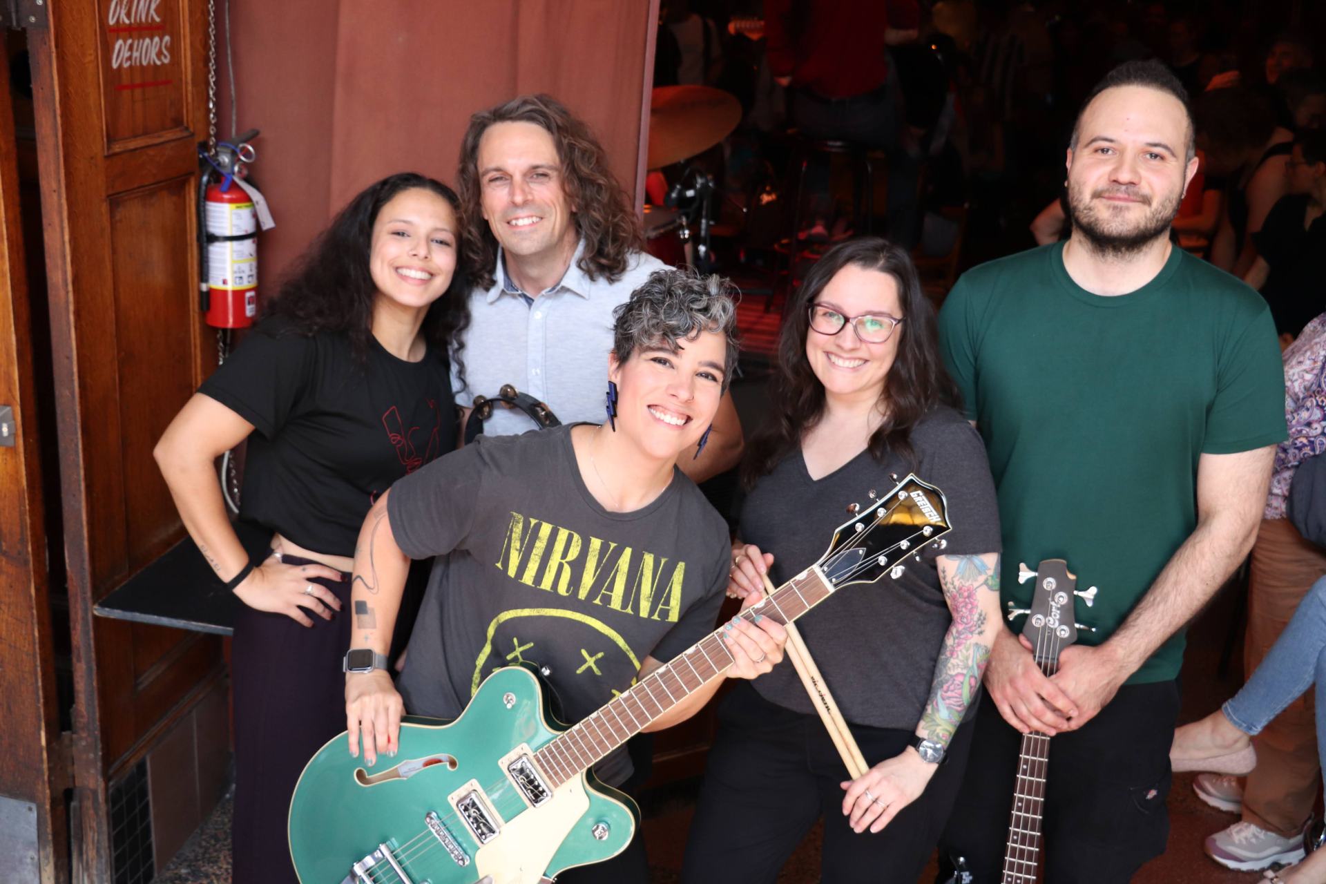 Musiprof band C'est what posing as a group after the recital at Quai des Brumes in Montreal, Quebec.